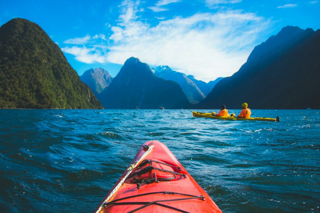 Canoe trip adventure water fjord milford sound new zealand travel